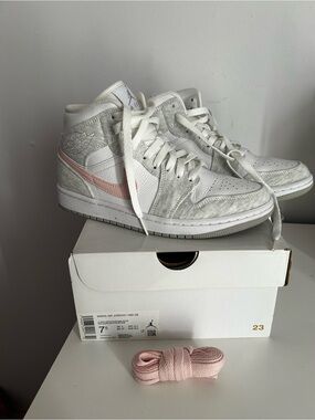 Jordan Women’s Mid-Top Sneakers in White and Light Pink